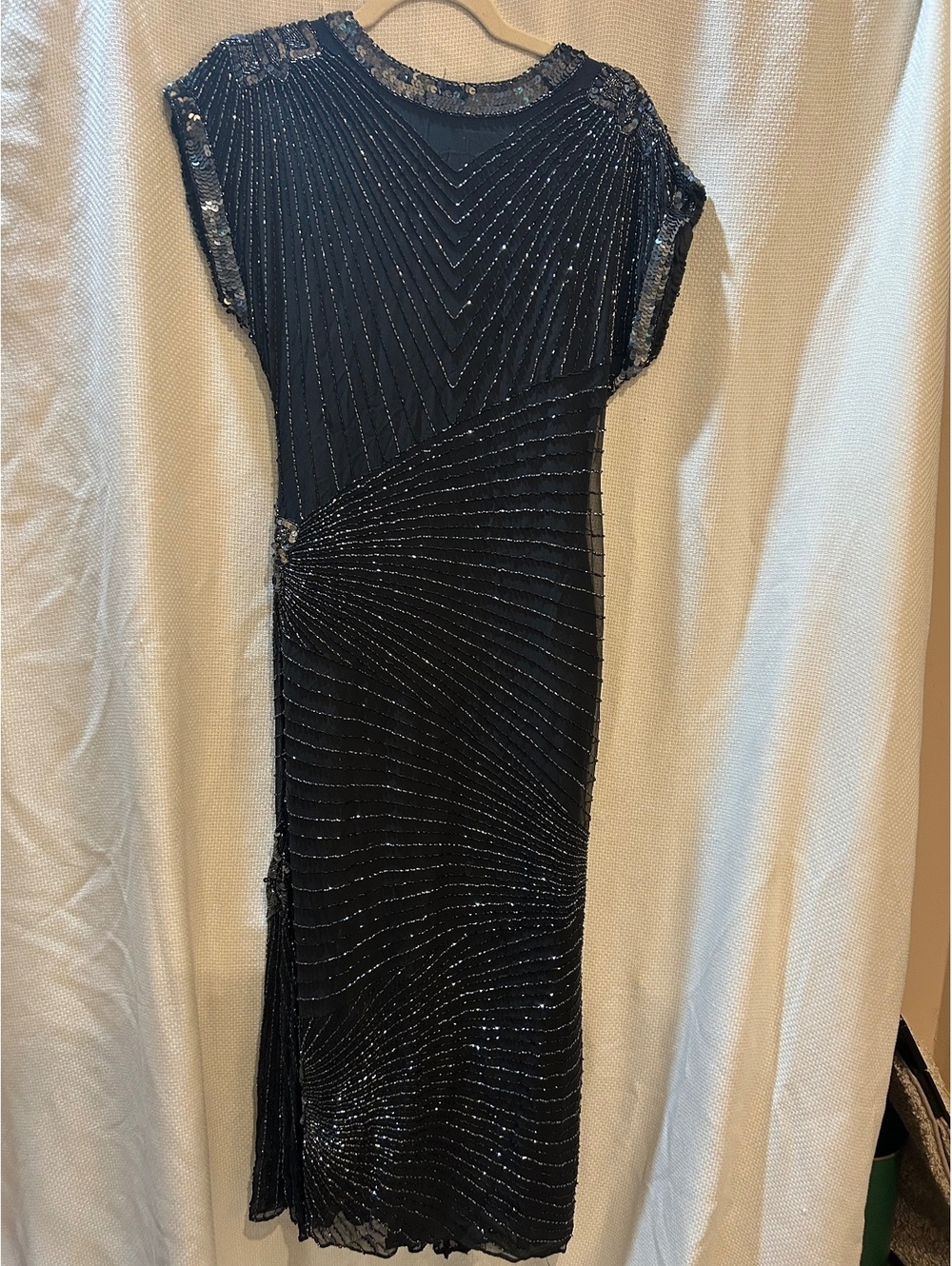 Elegant Black Beaded Evening Dress with Sequin Detailing and Open Back